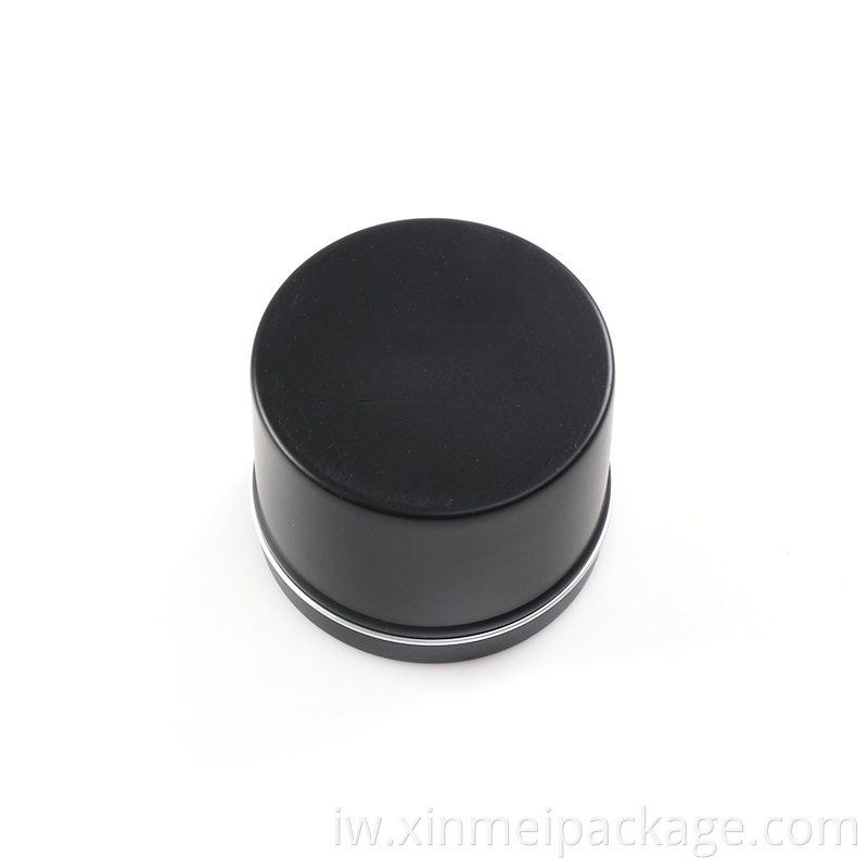 Black round tin